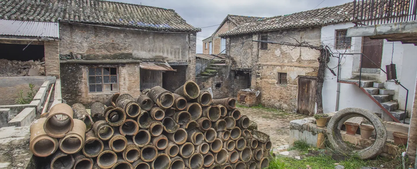 Heritage Tour of ceramics, design, craft traditions, conservation at a historic Granada institution.